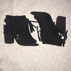 Black fringe booties.